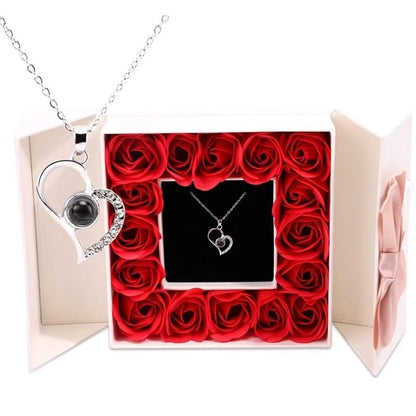 Projection necklace shown lit up displaying the 'I Love You' message
